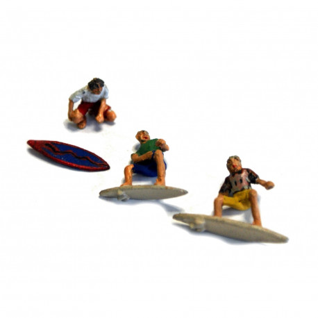 3 Surfers, 2 in riding positions and one waxing board. - Unpainted